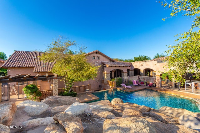 view of swimming pool featuring a patio