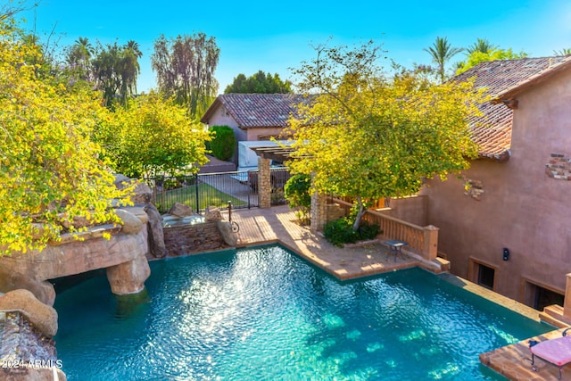 view of pool featuring a patio area