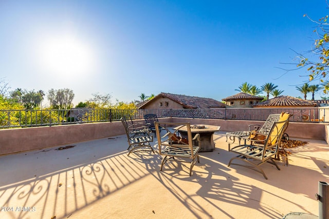 view of patio featuring an outdoor fire pit