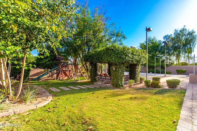 view of yard with a playground