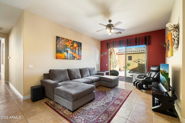 living room with light tile patterned floors and ceiling fan