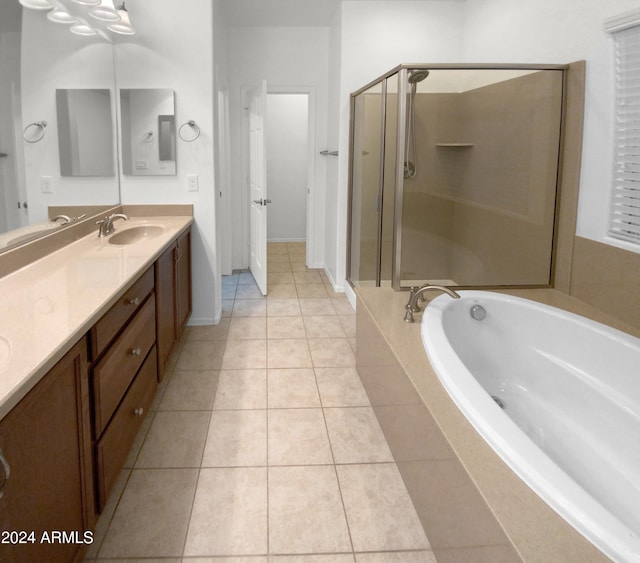 bathroom with vanity, tile patterned flooring, and separate shower and tub