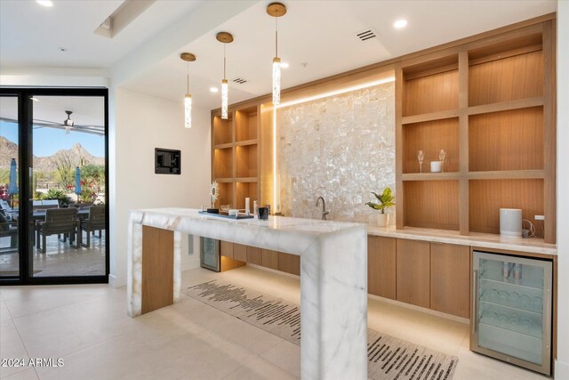 wine cellar featuring light tile patterned floors