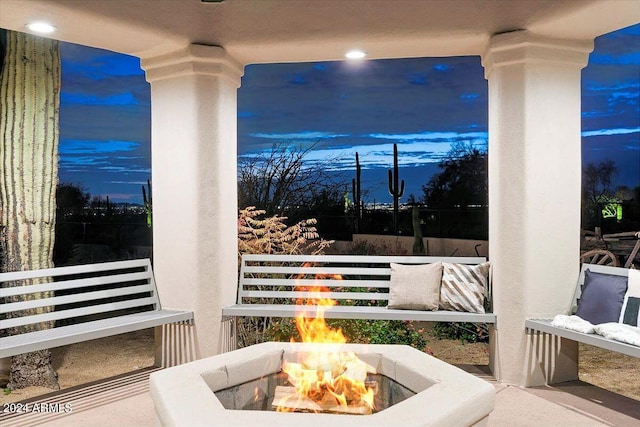 exterior space with a fire pit