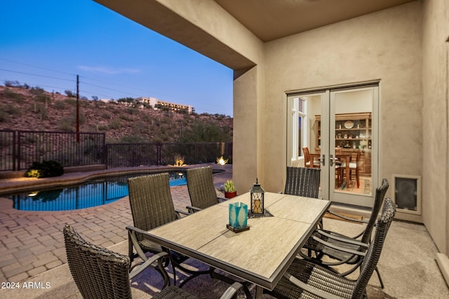 view of patio featuring a fenced in pool