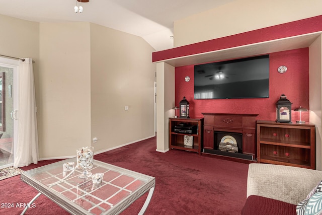 carpeted living room with lofted ceiling