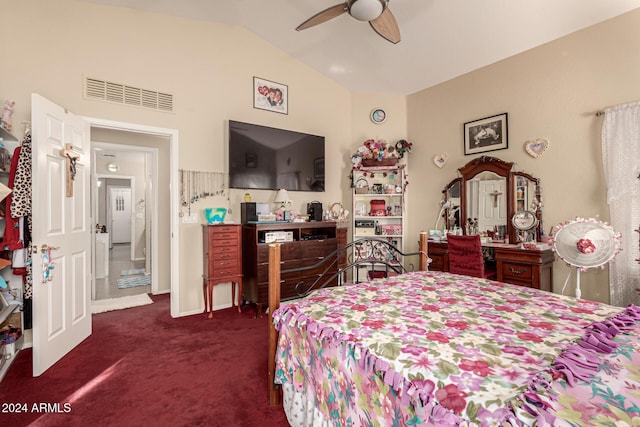 carpeted bedroom with ceiling fan and lofted ceiling