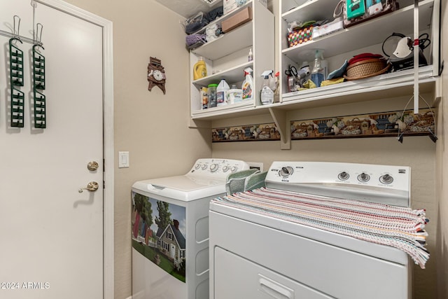 clothes washing area with independent washer and dryer