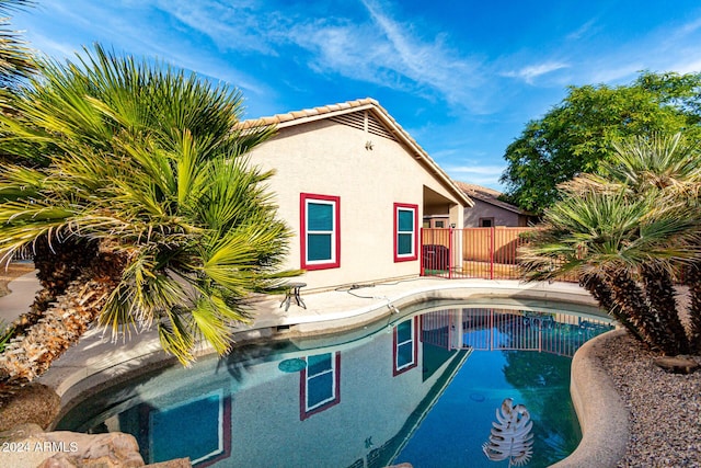 view of swimming pool featuring a patio