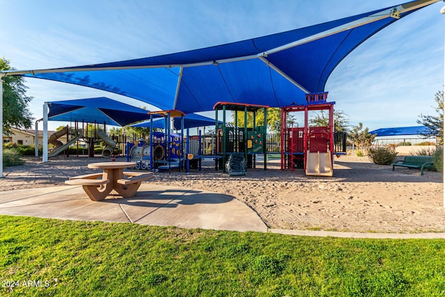 view of play area featuring a lawn