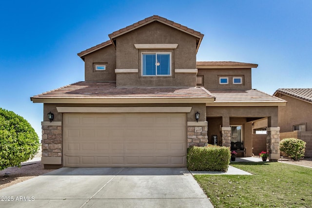 33335 N Slate Creek Dr, San Tan Valley, AZ 85143 - view of front of property with an attached garage, stone siding, a tile roof, stucco siding, and driveway