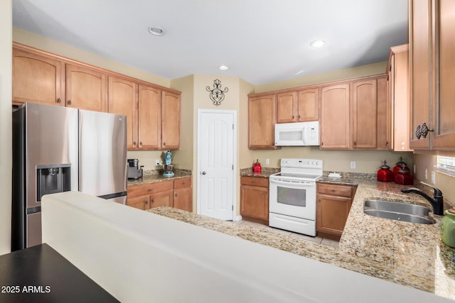 33335 N Slate Creek Dr, San Tan Valley, AZ 85143 - kitchen featuring a sink, recessed lighting, white appliances, and light stone countertops