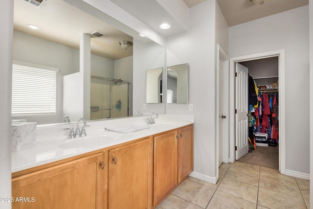 33335 N Slate Creek Dr, San Tan Valley, AZ 85143 - full bath with a stall shower, double vanity, a sink, and tile patterned flooring