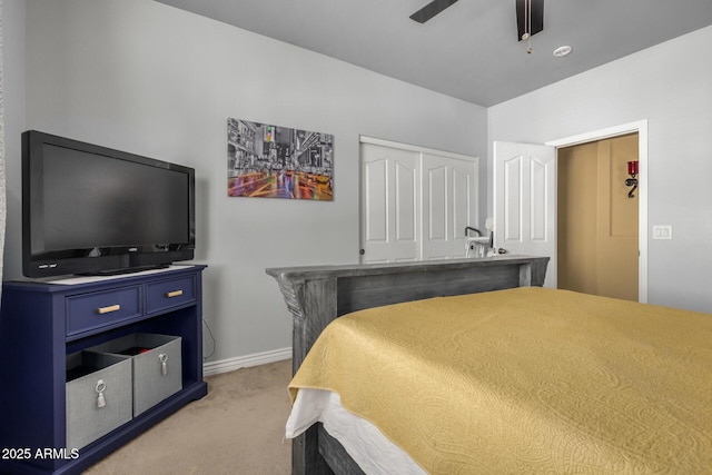 33335 N Slate Creek Dr, San Tan Valley, AZ 85143 - bedroom with a closet, light colored carpet, baseboards, and ceiling fan