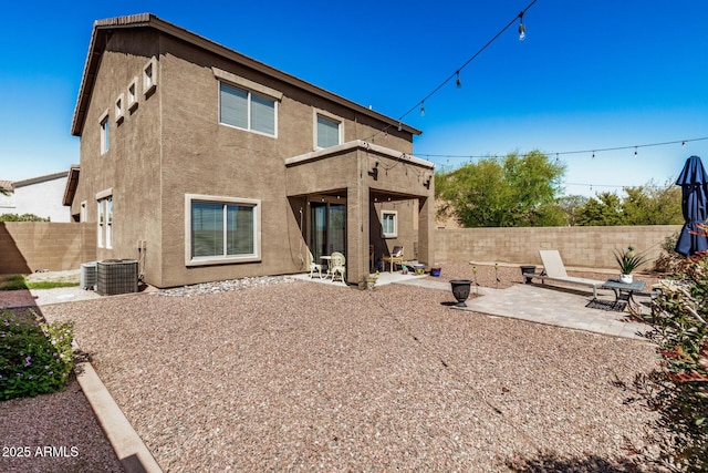 33335 N Slate Creek Dr, San Tan Valley, AZ 85143 - back of house with central AC unit, a fenced backyard, a patio, and stucco siding