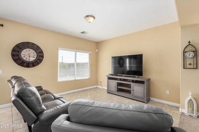 33335 N Slate Creek Dr, San Tan Valley, AZ 85143 - living area featuring light tile patterned floors, baseboards, and visible vents
