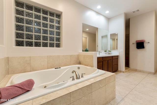 bathroom featuring tile flooring and vanity