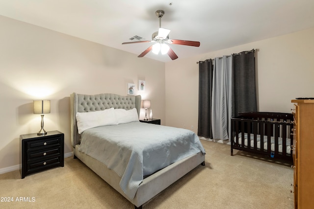 bedroom featuring ceiling fan and carpet flooring