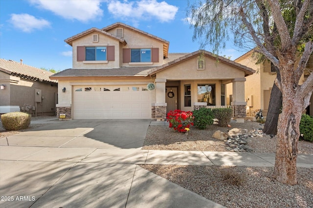 traditional home with stucco siding, a garage, and concrete driveway