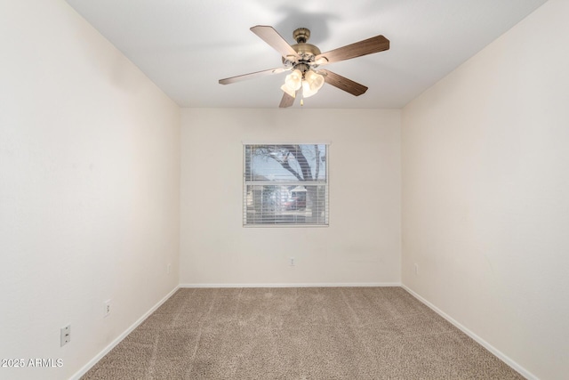 unfurnished room featuring carpet, baseboards, and ceiling fan