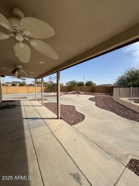 view of patio / terrace featuring a ceiling fan and a fenced backyard