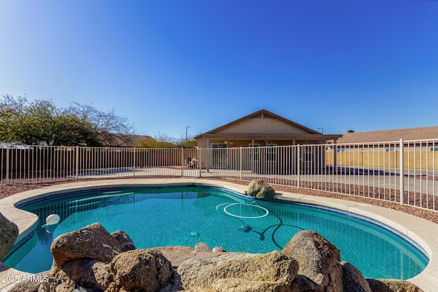 view of pool featuring a patio, a fenced in pool, and fence