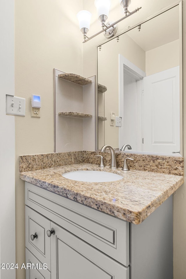 bathroom featuring oversized vanity