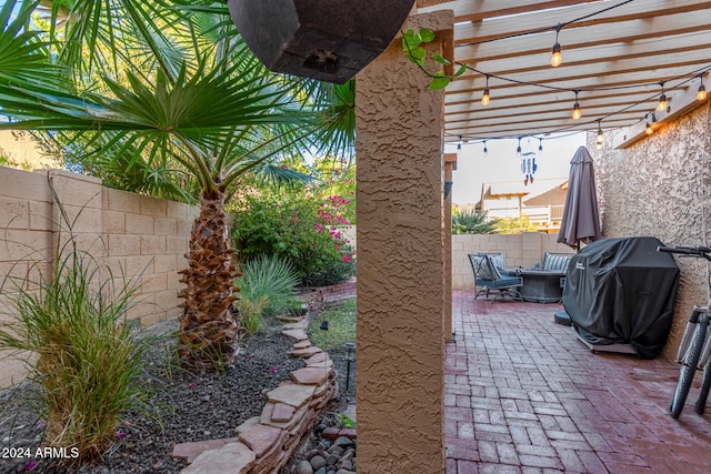 view of patio with a grill