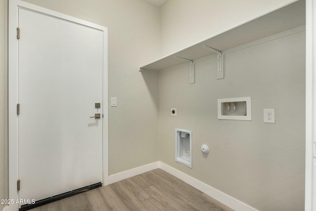 laundry area with electric dryer hookup, gas dryer hookup, hookup for a washing machine, and light hardwood / wood-style flooring