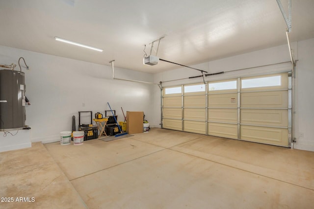 garage featuring a garage door opener and water heater