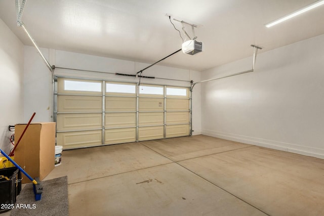 garage featuring a garage door opener