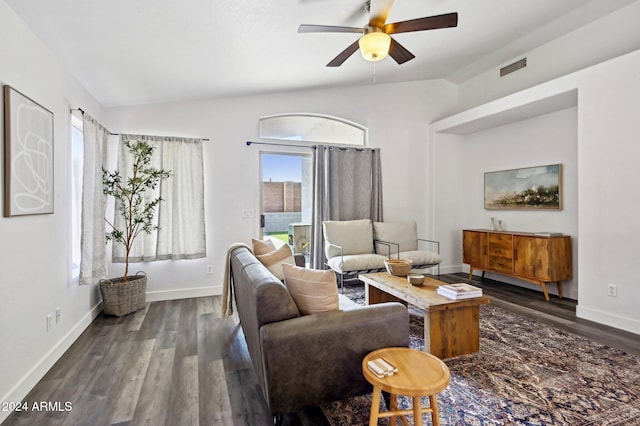 living room featuring lofted ceiling, ceiling fan, and dark hardwood / wood-style floors