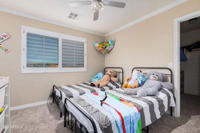 carpeted bedroom featuring crown molding and ceiling fan