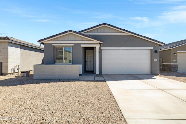 36257 W San Clemente Ave, Maricopa, AZ 85138 - ranch-style home featuring driveway, a garage, and stucco siding