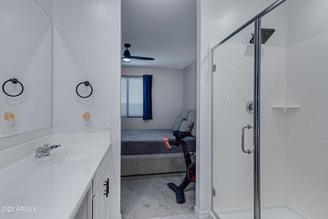 36257 W San Clemente Ave, Maricopa, AZ 85138 - full bathroom with a stall shower, ensuite bath, vanity, and a ceiling fan