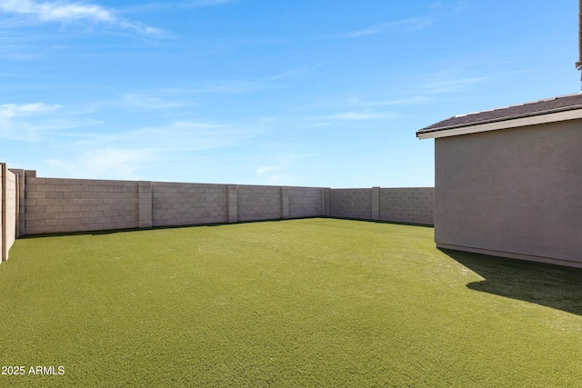 36257 W San Clemente Ave, Maricopa, AZ 85138 - view of yard featuring a fenced backyard