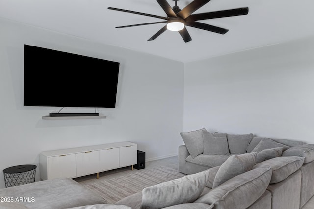 36257 W San Clemente Ave, Maricopa, AZ 85138 - living area featuring a ceiling fan and baseboards