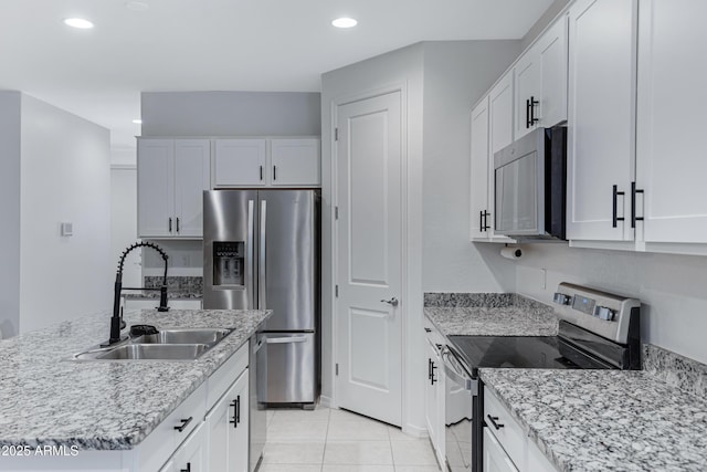 36257 W San Clemente Ave, Maricopa, AZ 85138 - kitchen featuring a sink, white cabinets, and appliances with stainless steel finishes