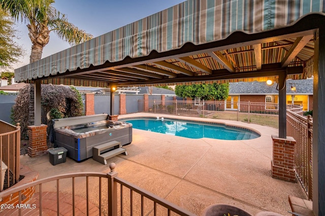 view of swimming pool with a patio area, a hot tub, fence, and a fenced in pool