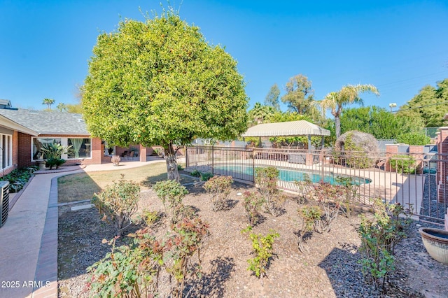 view of swimming pool featuring a fenced in pool, a patio area, and fence