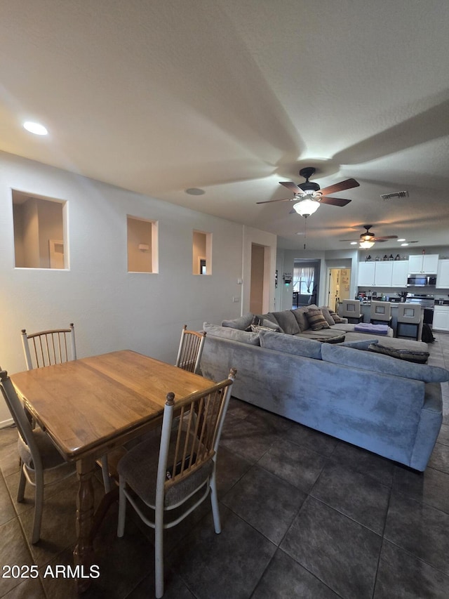 view of tiled dining space