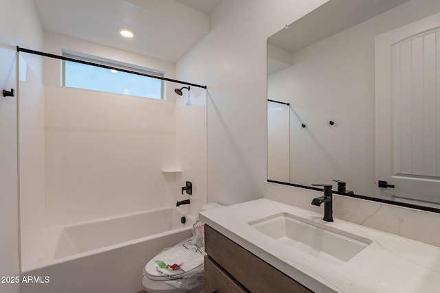 full bathroom with shower / bathing tub combination, vanity, and toilet