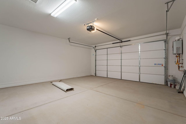 garage with a garage door opener and tankless water heater