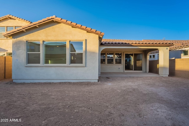 rear view of property with a patio area