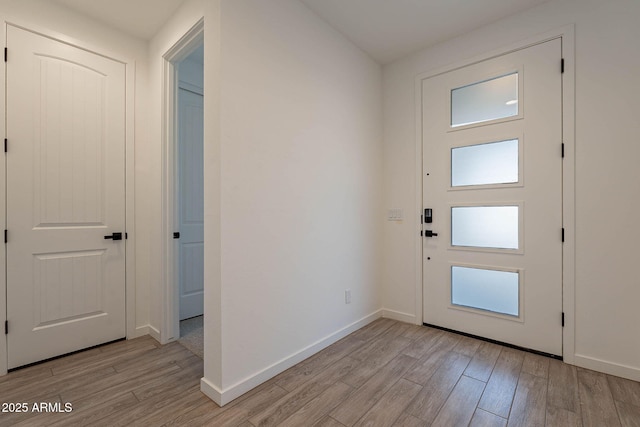 entryway with light wood-type flooring