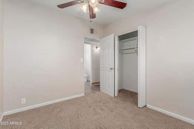 unfurnished bedroom with carpet, visible vents, ceiling fan, and baseboards