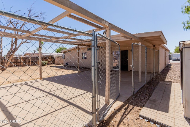 view of patio / terrace with a gate and fence