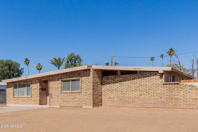 ranch-style home with brick siding