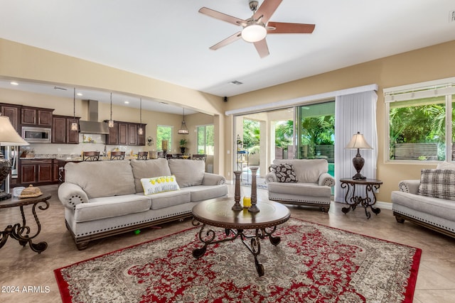 living room with ceiling fan