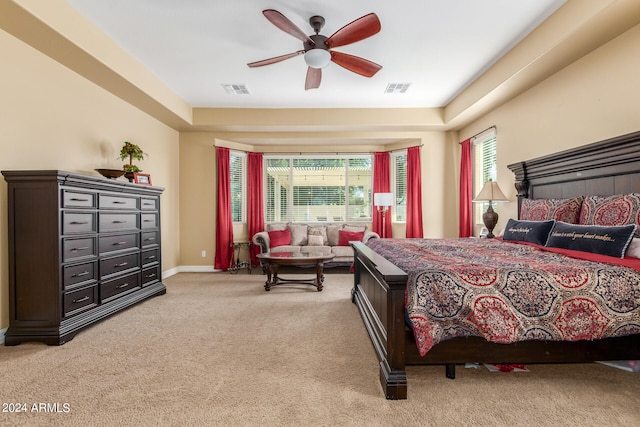 bedroom with ceiling fan and carpet